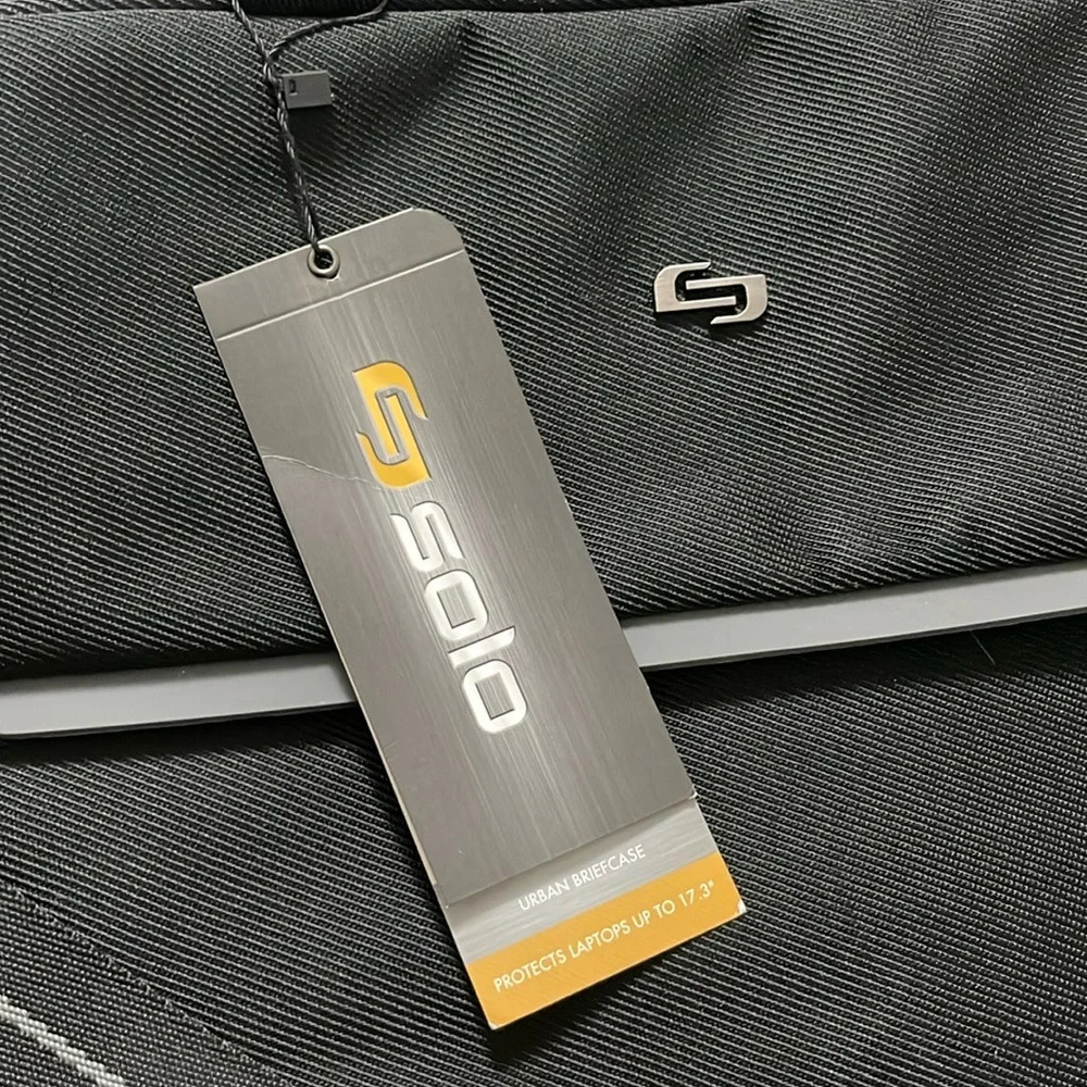 Solo Urban Briefcase. Can hold laptops up to 17.3”. Brand New With Tags.